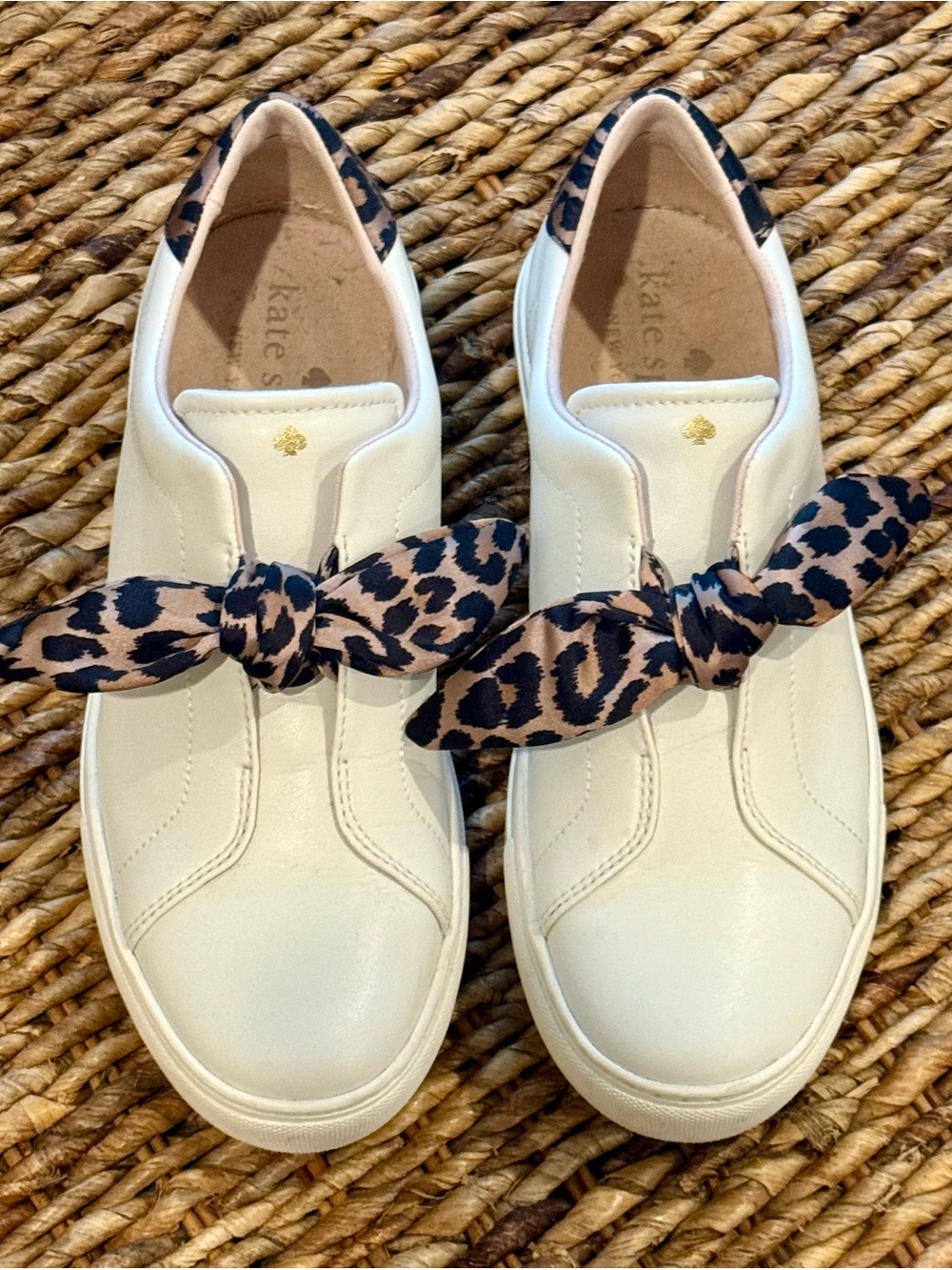 Kate Spade White Slip-On Sneakers with Leopard Print Bow Accent